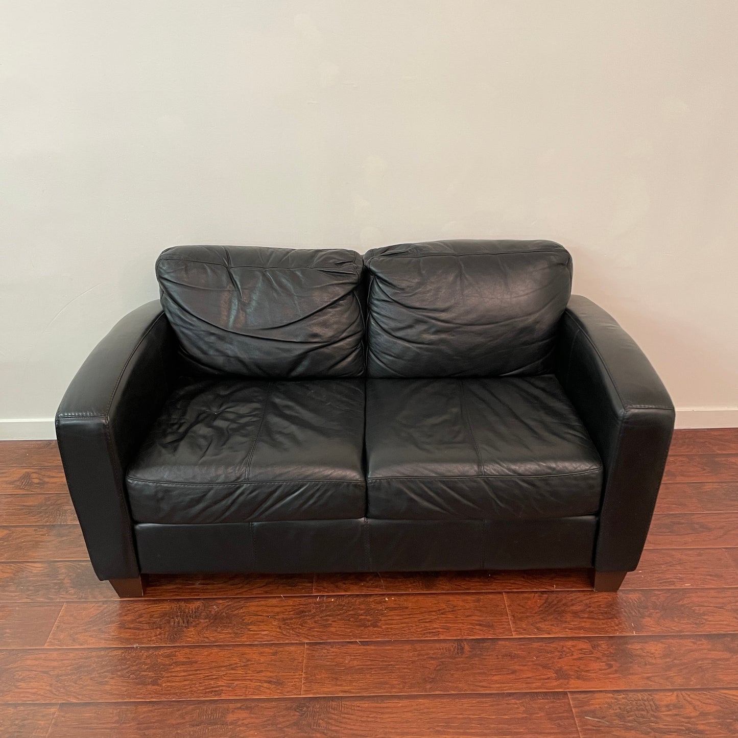 Black Leather Love Seat