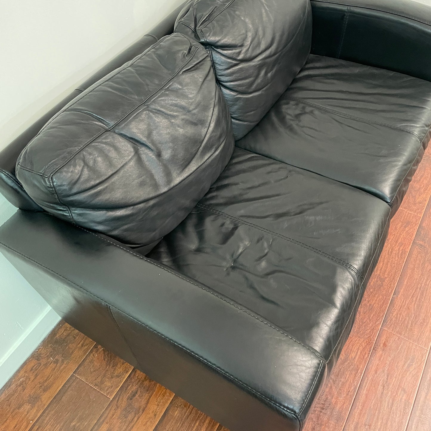 Black Leather Love Seat