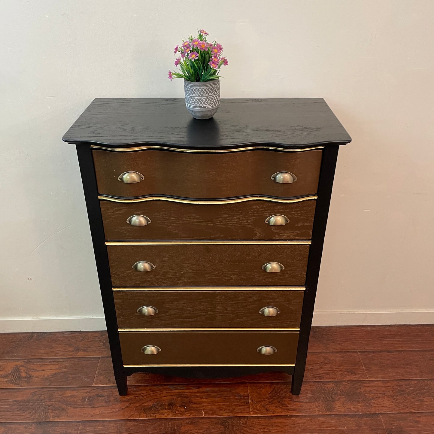 Serpentine Black and Gold Dresser