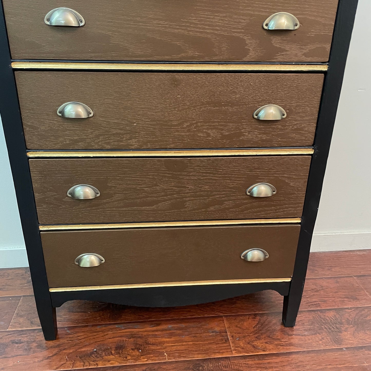 Serpentine Black and Gold Dresser