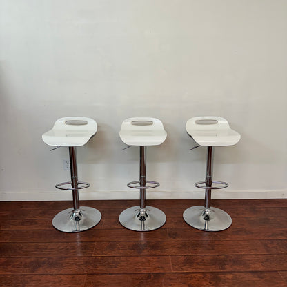 White Swivel Adjustable HeightCounter Stool (set of 3)