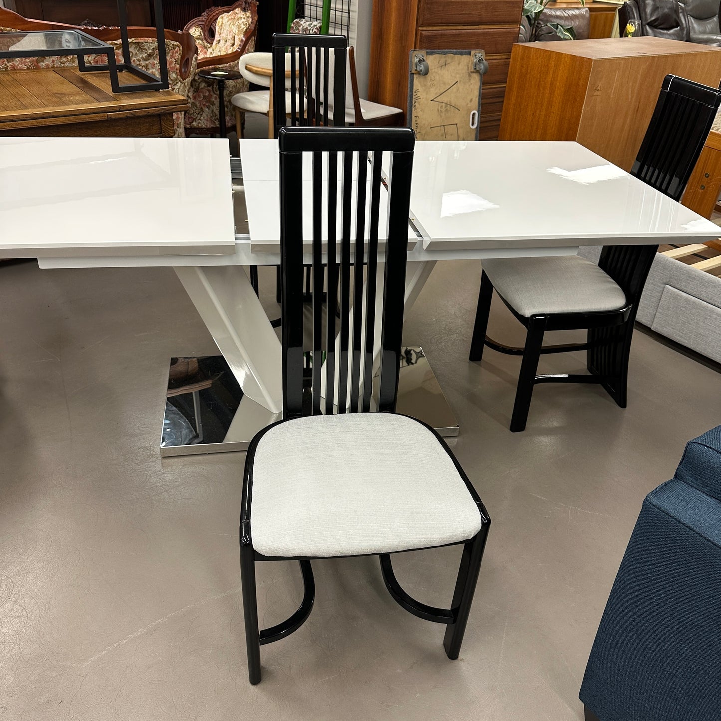 High-End Extendable Dining Table with Italian Dining Chairs