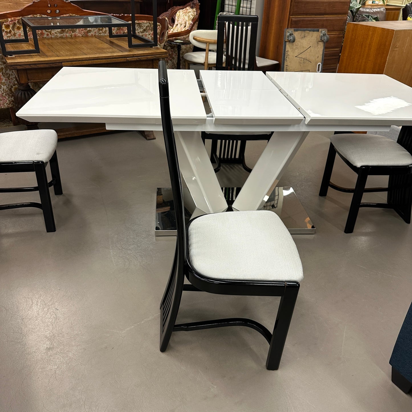 High-End Extendable Dining Table with Italian Dining Chairs