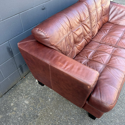 Distressed Leather Love Seat