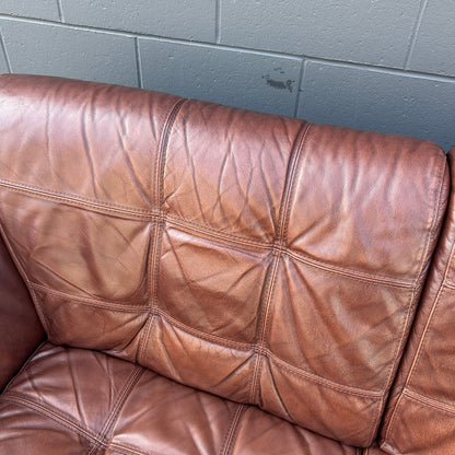 Distressed Leather Love Seat