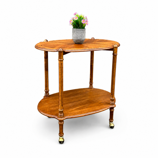 Antique butler bar serving cart with flower vase