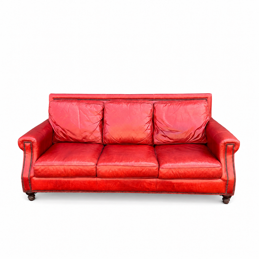 Bradington-Young red leather sofa on a white background - front view