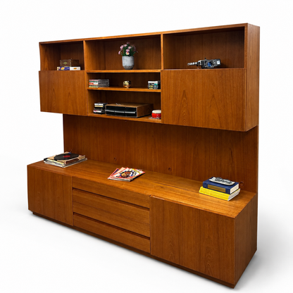 1960s Danish teak wall unit on a white background, alternate angled view