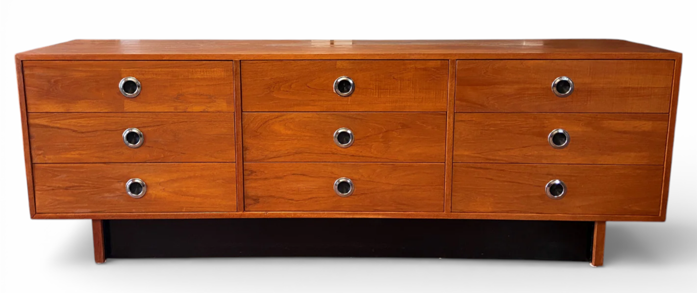 Wooden dresser with matching queen bed and nightstands on a white background