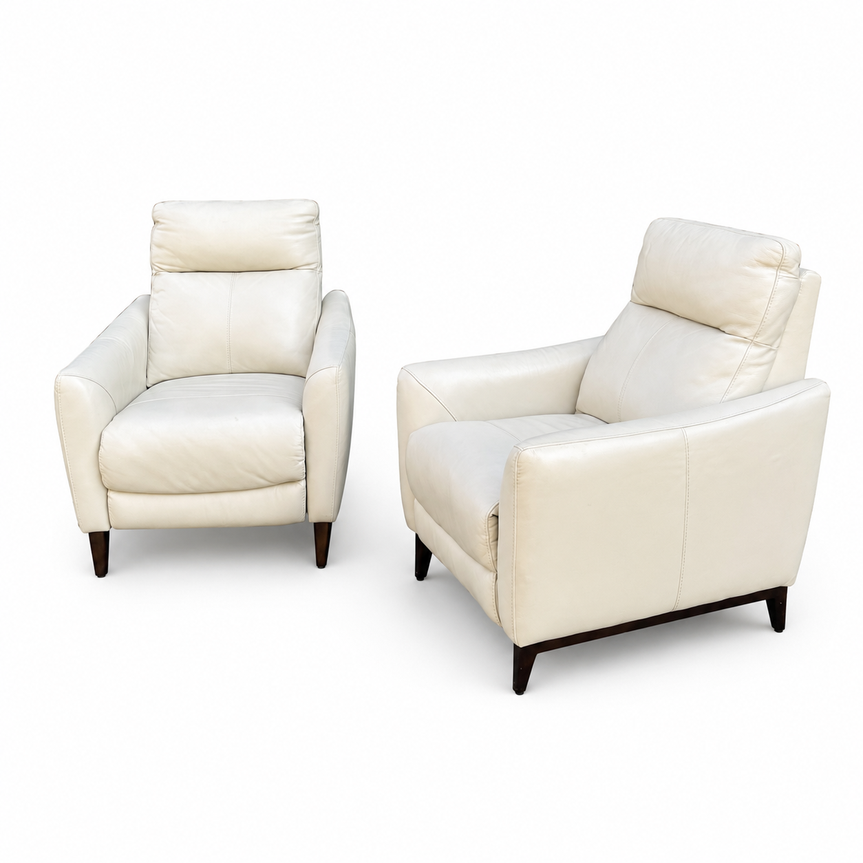 Set of two Gilman Creek cream leather pushback recliners