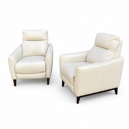 Set of two Gilman Creek cream leather pushback recliners