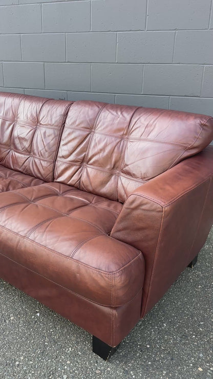 Distressed Leather Love Seat